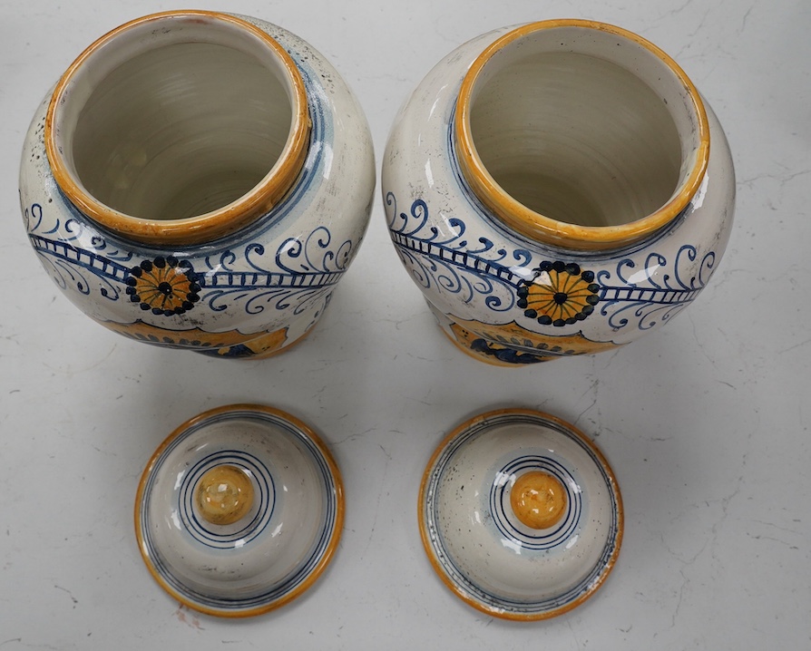 A pair of 17th century style maiolica drug jars and covers, 34cm. Condition - good